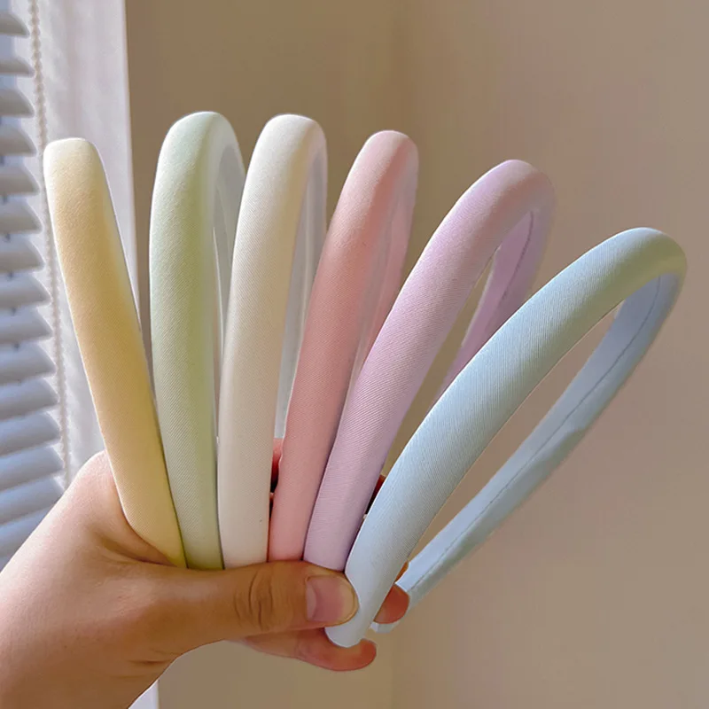 ที่คาดผมฟองน้ำรูปมาการองสไตล์เกาหลีสำหรับผู้หญิงที่ล้างหน้าขอบแคบห่วงรัดผมเรียบง่ายของเด็กผู้หญิงแฟชั่นที่รัดผม