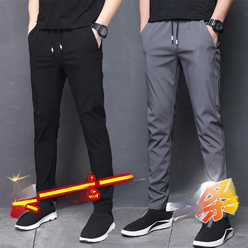 

Мужские летние повседневные брюки с драпировкой из ледяного шелка, эластичные свободные брюки большого размера, спортивные девятиczęściowe брюки, молодежные длинные брюки с низкой талией...