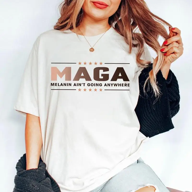 

Футболка MAGA Melanin Aint Going Anywhere Immigration Daughter Of Immigrants Latina Power Protest