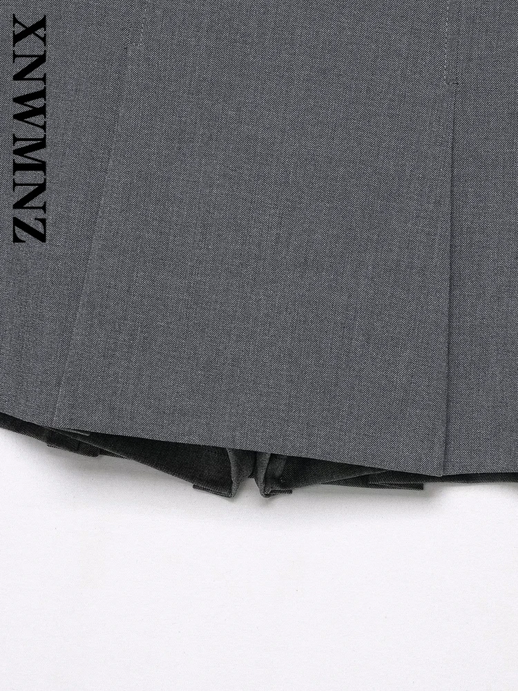 XNWMNZ 2025 automne nouvelles femmes vêtements Sexy décontracté mini jupe plissée Chic mode femme gris Simple mince avec ceinture