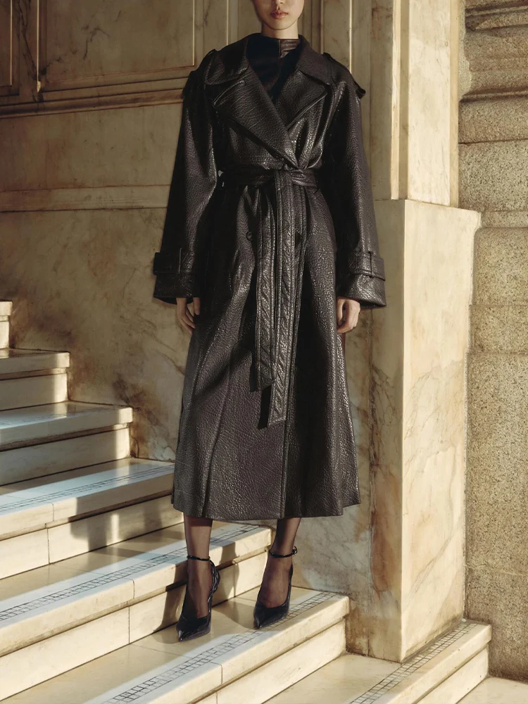 

European style new women's fashionable and versatile solid color lapel faux leather trench coat with lychee pattern.