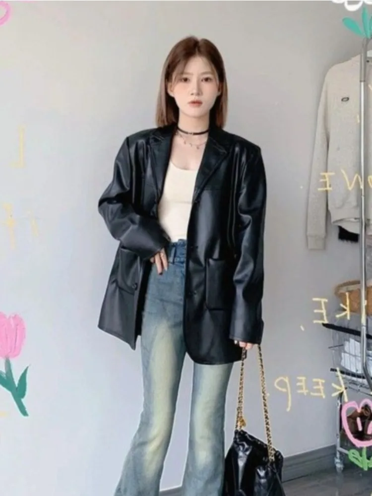 Czarna, długa kurtka skórzana z dużymi kieszeniami, damska, codzienna, luźna kurtka motocyklowa, modna kurtka skórzana damska, jesień 2025, streetwear, koreański styl.