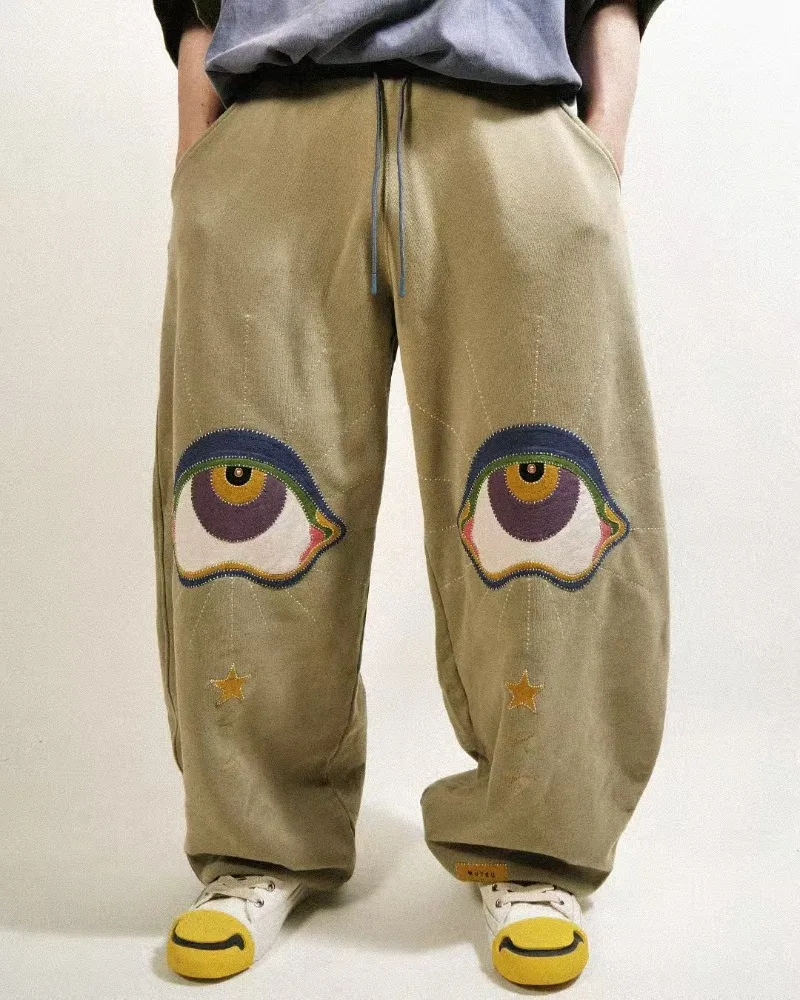 

Американские ретро темно-зеленые уникальные мужские повседневные брюки с вышивкой глаз Y2K, новые уличные модные готические брюки, свободные спортивные брюки для пар