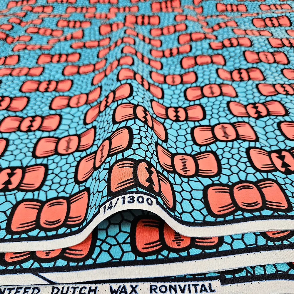 Tkanina Ankara z motywem świątecznym, wzór kokardek, drukowana na wosku Hollandais, do dekoracji wnętrz i rękodzieła.