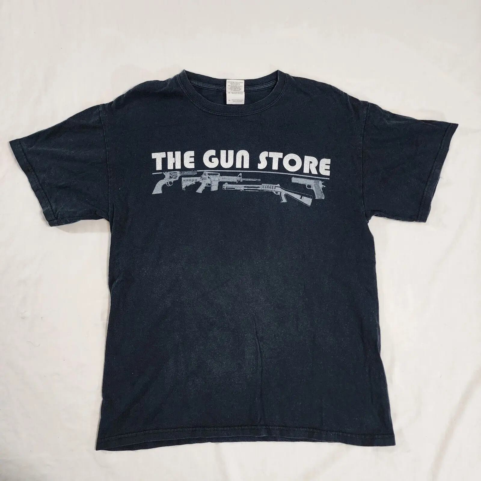 

Vintage 90s T-Shirt The Gun Store Las Vegas Weapon SMG Band Tee Mens Size Medium