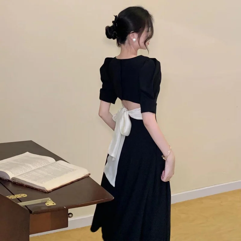 

Summer New French Style Square Neck Puff Sleeve Hepburn Style Little Black Dress with Bow Tie Waist and Backless Design Wome