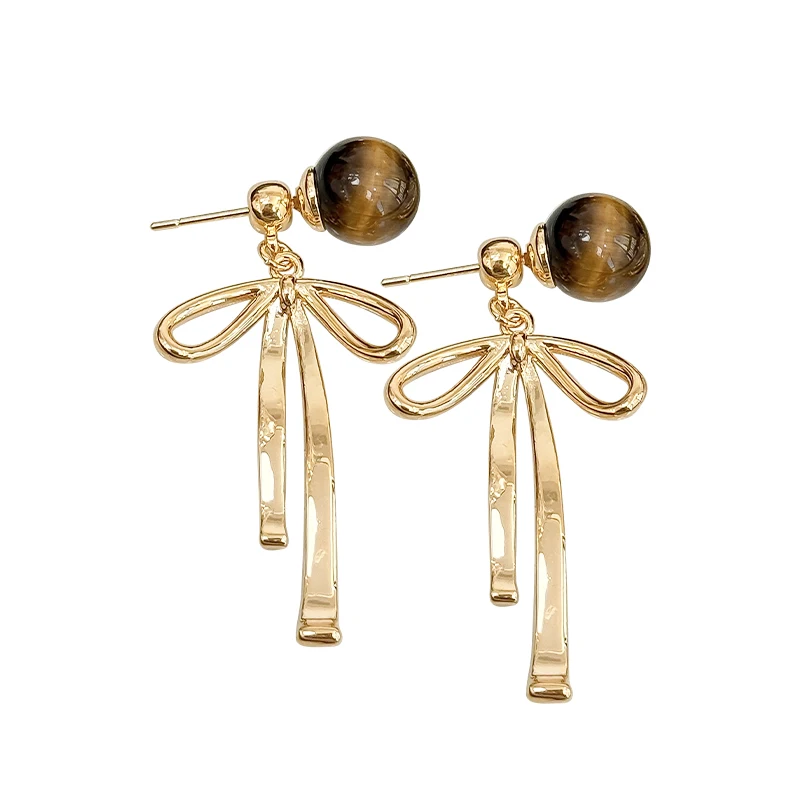 

Autumn and winter Maillard ribbon bow tiger's eye stone rear hanging earrings high-end light luxury earrings new