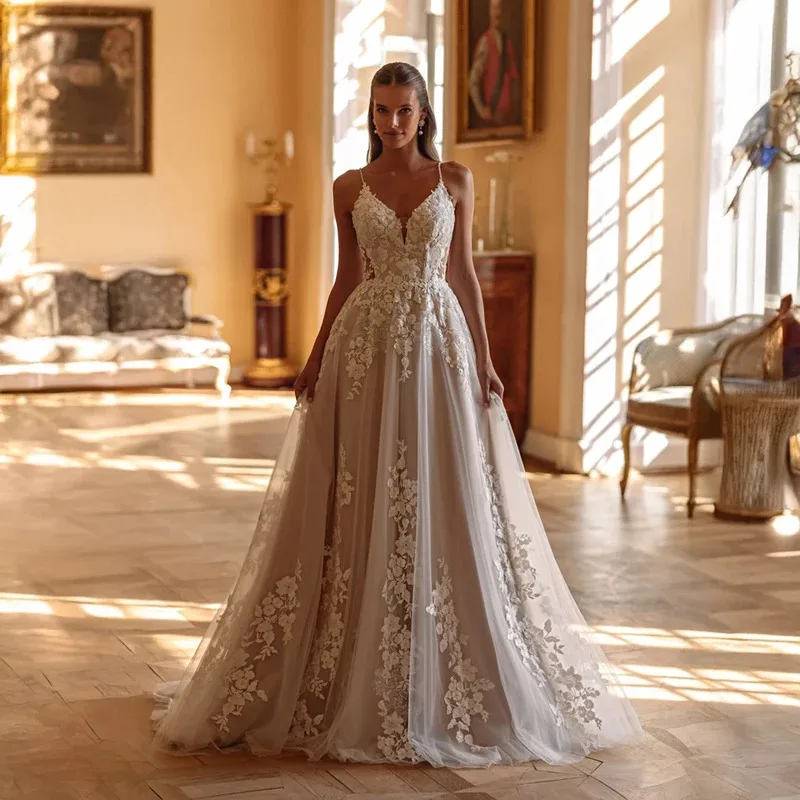 Customized Exquisite Bridal Dress Featuring Spaghetti Straps Applique Lace A-line Champagne Wedding Dress for Bride