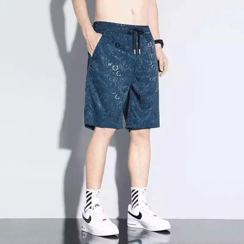 Summer thin jacquard ice silk quick drying shorts for men with a sense of luxury, loose and breathable, versatile, casual and sp