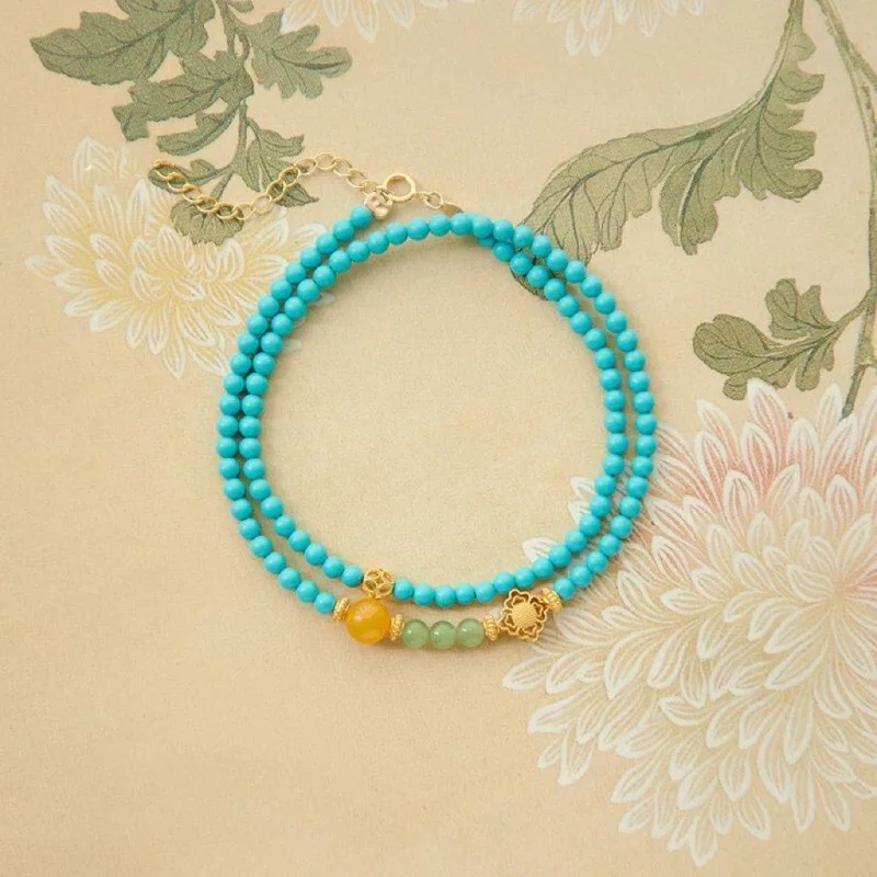 Turquoise bracelet with multiple layers, double loops, stacked amber , high-quality porcelain small beads, and 3 Chinese-st