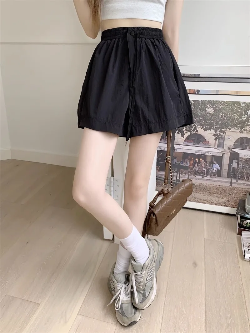 Pantalones cortos para mujer Y2K Denim Harajuku Vintage tiro bajo caliente Mini cadera envuelto ropa de calle azul moda botín pantalones de verano europeos