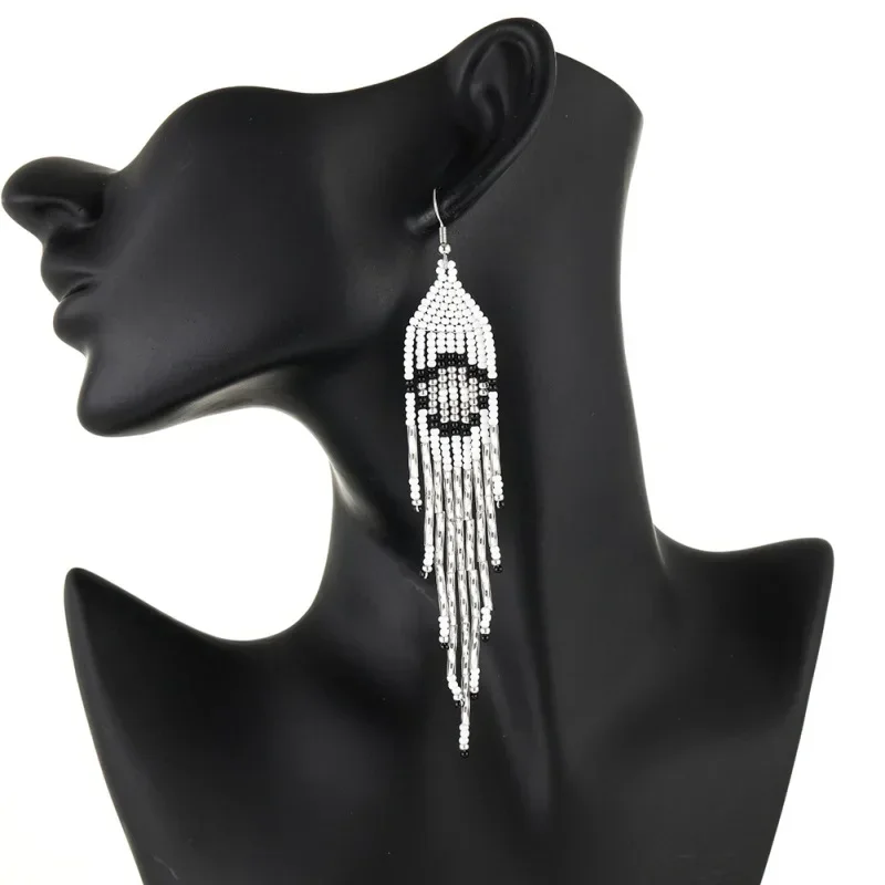 Rice bead earrings Tassel Black and white Originality Geometry Design Hand knitting Bohemia Alloy Fashion Simple Beaded earrings image 4