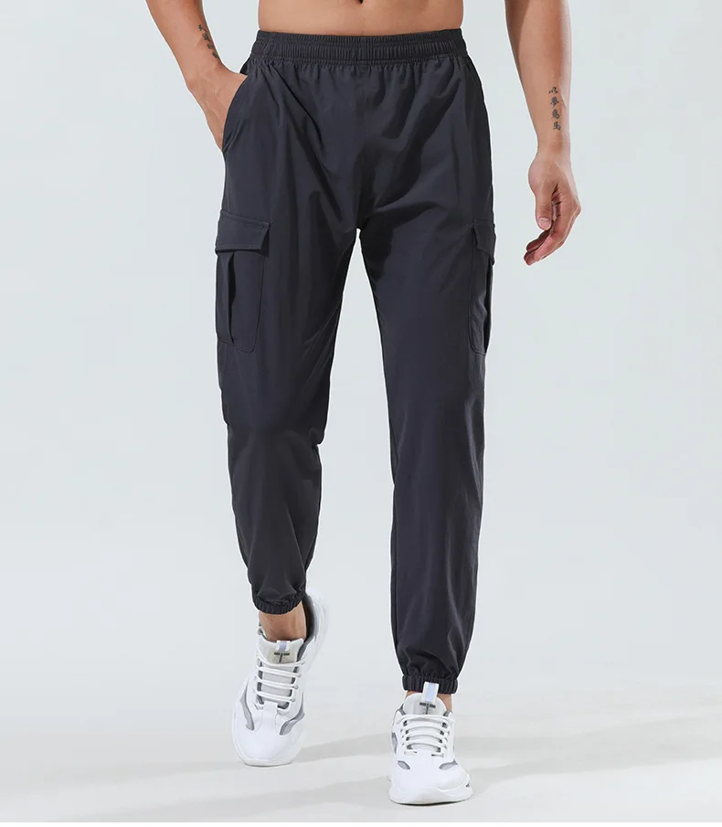 Sports pants Outdoor quick-drying pants Loose woven stretch-tied feet Fitness casual tooling trousers joggers