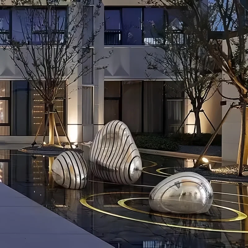 

Hotel lobby outdoor floor decoration, villa swimming pool decoration art, stainless steel rockery, hollow stone carvings