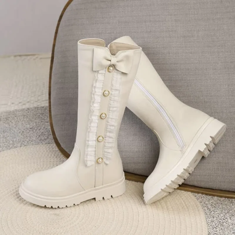 

2025 Милые сапоги до середины икры для девочек с круглым носком на плоской подошве с узлом-бабочкой, маленький размер 31, 32, 33, современные вечерние ботильоны на молнии сбоку