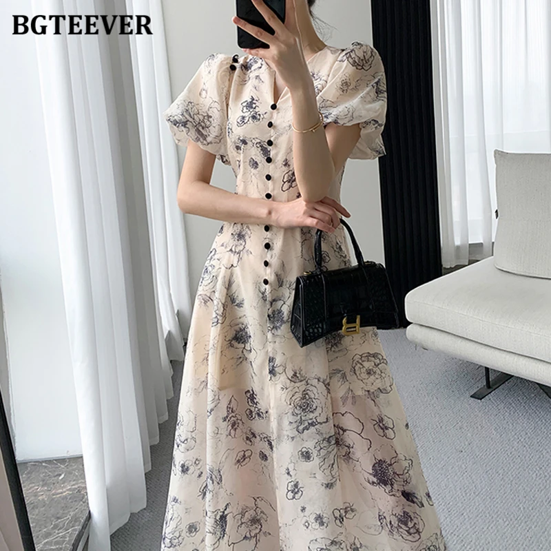 فستان BGTEEVER أنيق برقبة على شكل حرف V وخصر نحيف مزين بالزهور للنساء للربيع والصيف وأكمام منتفخة مطبوعة على شكل حرف a فستان نسائي