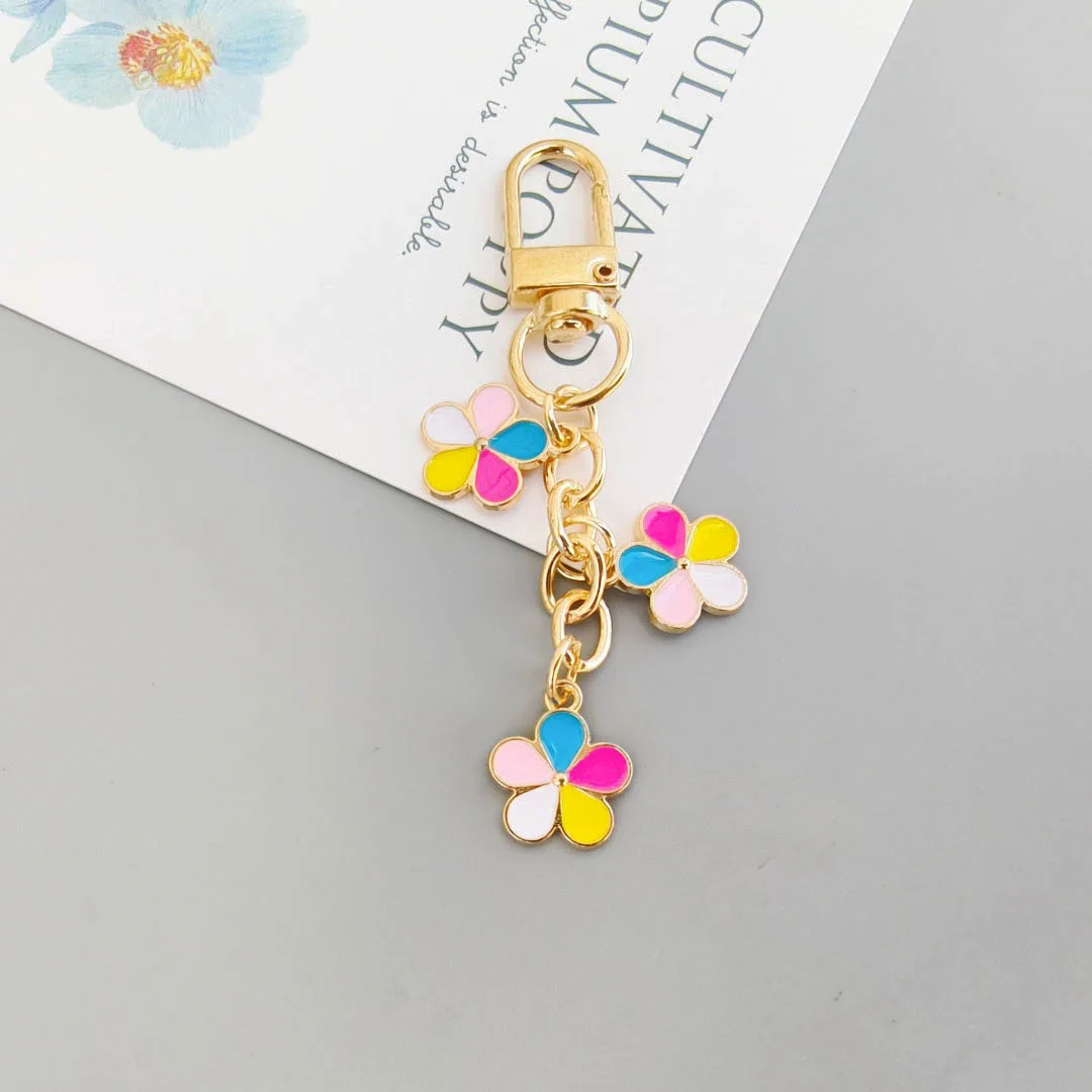 H0681+flow-4WH-Keychain pendant, colorful cherry blossom bag decoration, key pendant, metal keychain wholesale