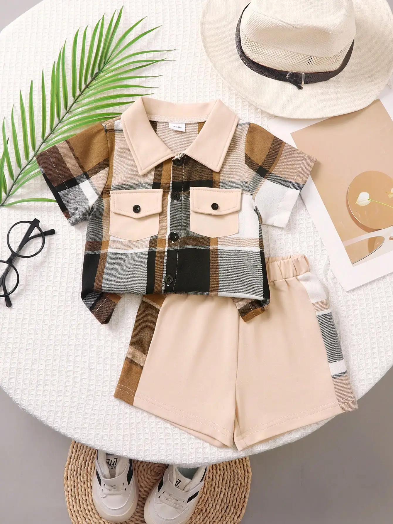 Baby Boy's Retro Plaid Short-Sleeve Shorts Two-Piece Set, Shirt-Style Top with Turn-Down Collar and Double Pocket Design, Side Plaid Patchwork Shorts, Loose and Casual Fit, Suitable for Summer Outings and Daily Wear, Stylish and Handsome Children's Summer Outfit Set.