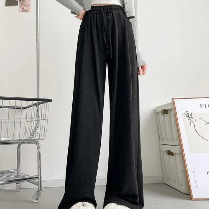 

2024 Women's Autumn Winter New Splicing Elasticized High-waisted Drawstring Pocket Fashionable Loose Solid Color Casual Pants