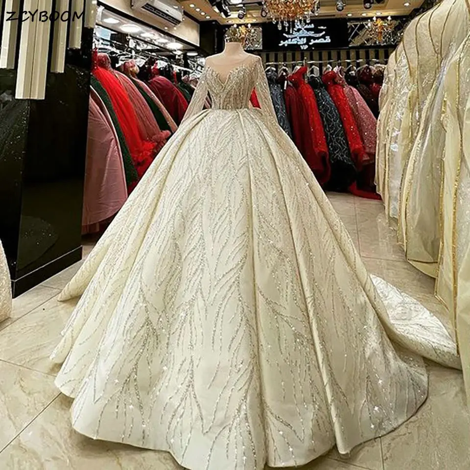 

2023 Exquisite Illusion Long Sleeves Dubai Ball Gown Wedding Dresses Sparkly Sequined Saudi Arabic Bridal Gowns Vestido De Noiva