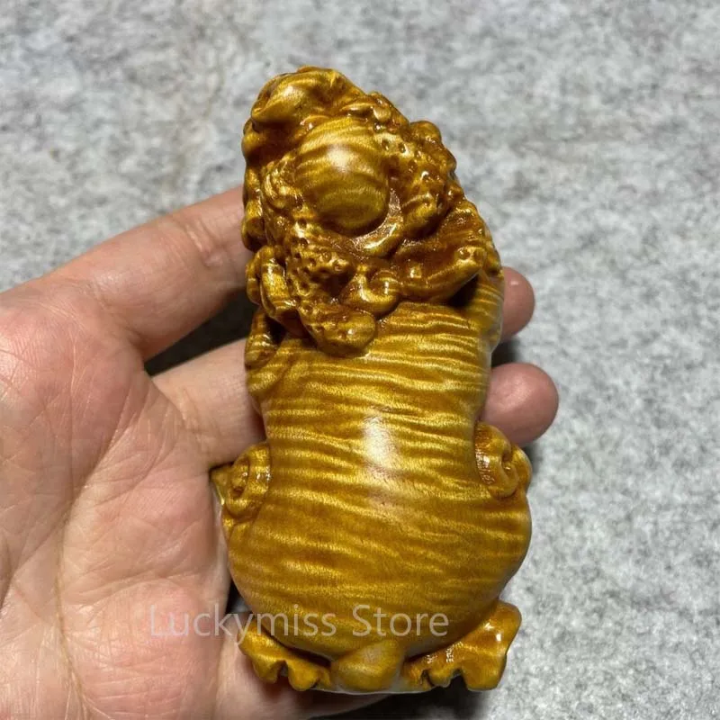 Golden Nanmu Pixiu Hand Carving Natural Water Ripple Grain Worry Hand Piece Wealth Ornament for Home Office Desktop Decor