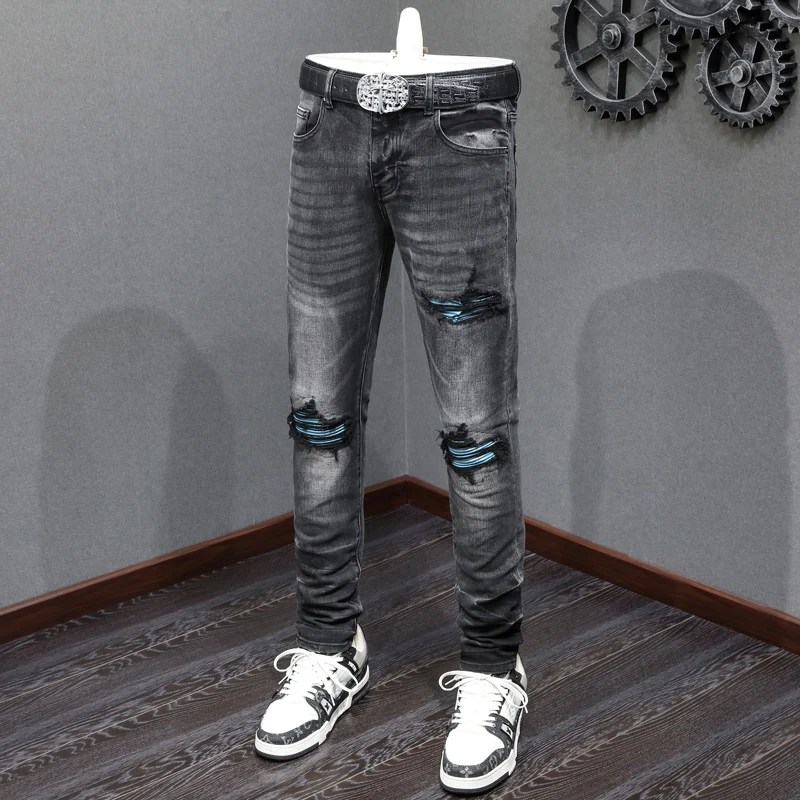 Modeontwerper Heren Jeans Hoge kwaliteit Retro Zwart Grijs Stretch Skinny Fit Gescheurde Jeans Heren Lederen Gepatchte Hip Hop Merkbroek