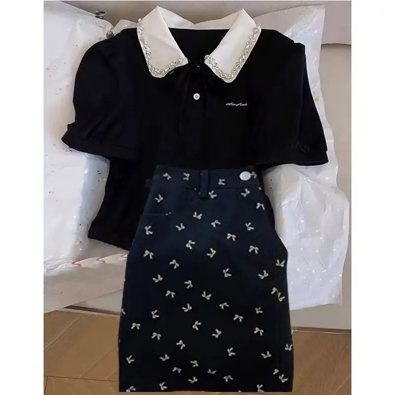 

Летний новый комплект женской одежды больших размеров: укороченный топ и длинная юбка, модный комплект из двух предметов для стройнящего эффекта.