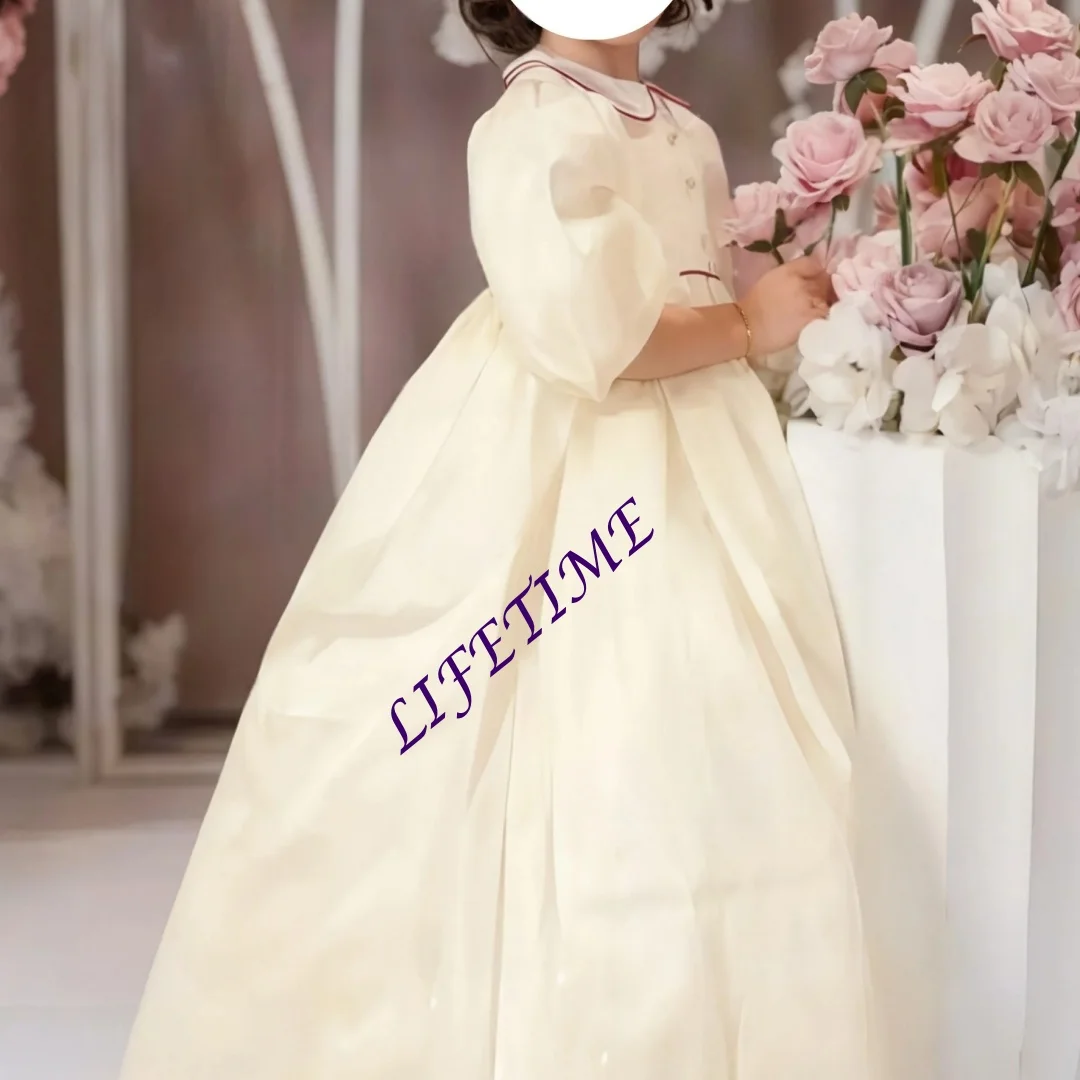 Elegant Ivory White Satin Flower Girl Dress with Puffy Sleeves for Wedding Ceremonies Formal Receptions And Holiday Celebrations