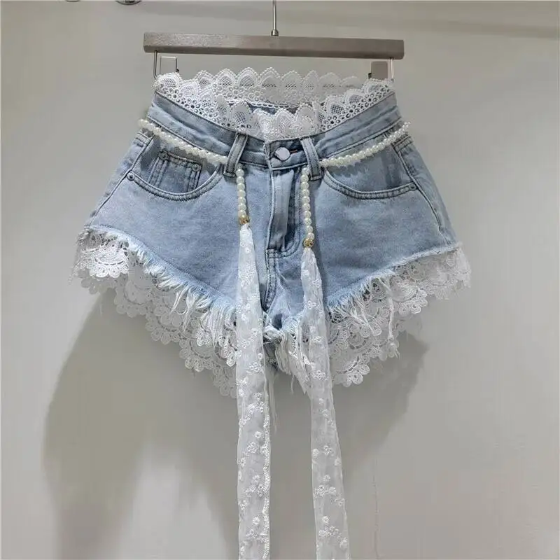 ANJY Summer New Women Fashion Ins Patchwork Lace Raw Edge Denim Shorts Elegant Stylish High Street Pearl Sashes Hot Pants A24131