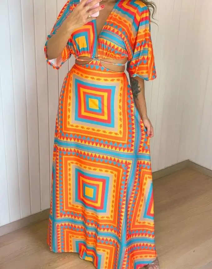 Abiti da donna 2025 Estate nuova stampa geometrica vita scava fuori Boho maxi abito casual mezza manica legato dettaglio abito da vacanza