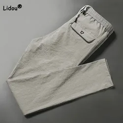 Pantalones informales con bolsillos para hombre, a la moda ropa masculina, de Color sólido, cómodos, con cintura elástica y cordón, para verano, 2023