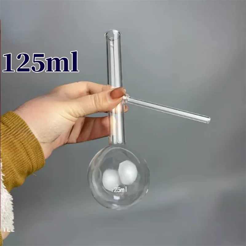 Determination of atmospheric distillation characteristics of a 125ml distillation range flask with a branch