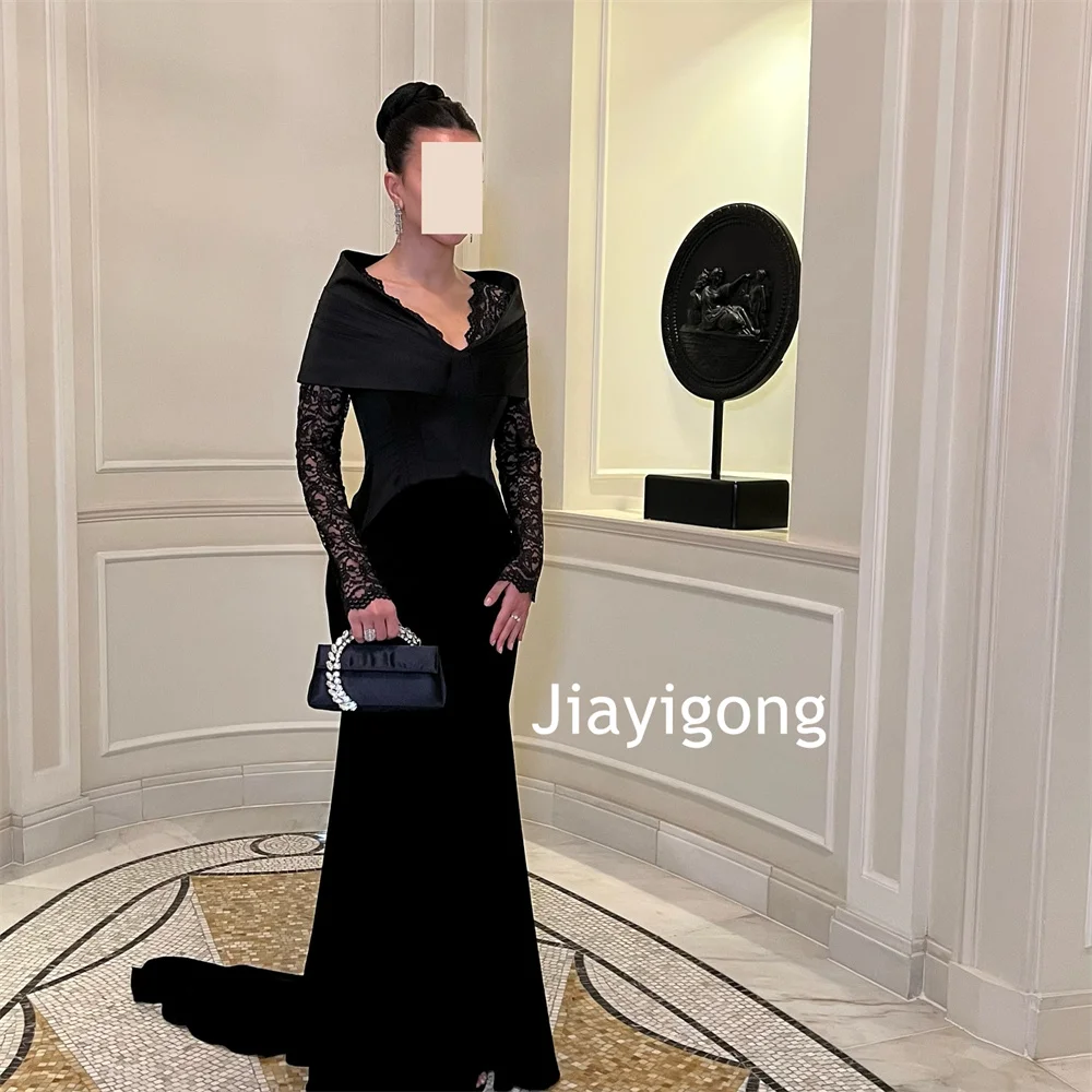 Abiti lunghi con scollo a V a sirena in pizzo con pieghe in jersey semplice personalizzato Taglie per feste su misura disponibili di alta qualità