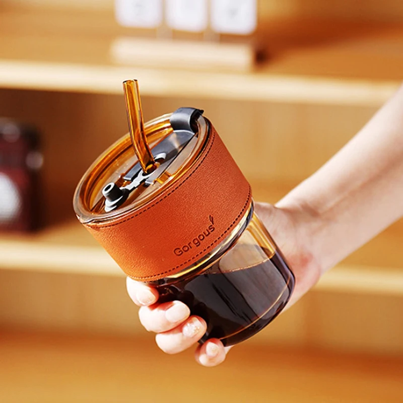 Reusable glass drinking cup with secure lid