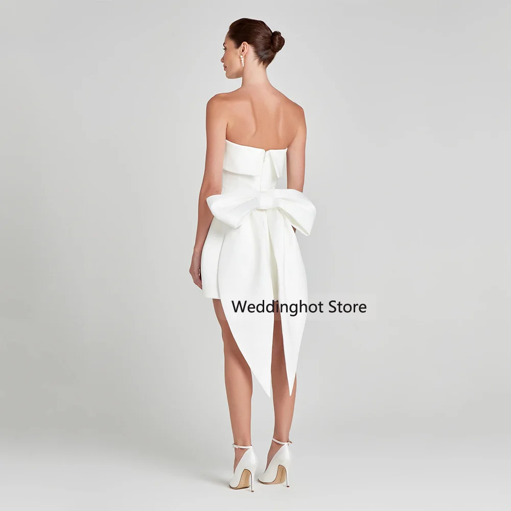 فساتين كوكتيل الزفاف للعروس بدون حمالات بفيونكة كبيرة فساتين كوكتيل صغيرة للنساء 2025 فستان زفاف قصير بدون أكمام