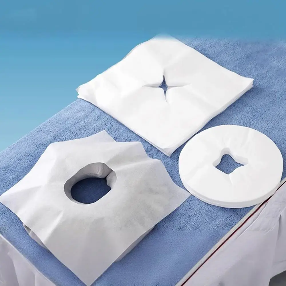100PCS Usa E Getta Tavolo Da Massaggio Foro Asciugamano Bellezza Essenziale Addensare Tavolo Poggiatesta Coperture Tessuto Non tessuto Strumento di Trucco