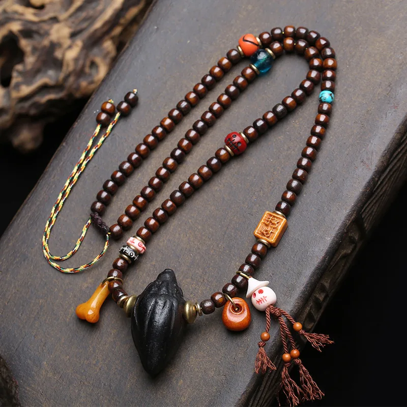 

Tibetan-style Nangla Chakcha pendant, jumper chain, glass beads, yak bone clasps, scarecrow accessories, recycled bone necklace
