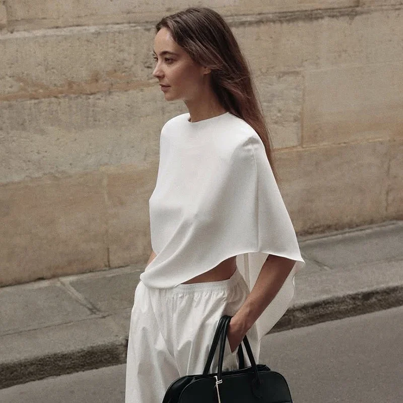 Damska bluzka Fmxires na jesień, jednolita, z zamkiem błyskawicznym z tyłu, asymetrycznym dołem, bez rękawów, luźna, uniwersalna, z wyściełanymi ramionami.