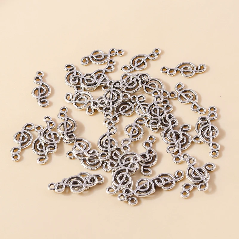 Leslie 50 szt. 19x8mm Metalowe Zawieszki Nuty Muzyczne Urocze Kolczyki Naszyjniki Wisiorki DIY Akcesoria do Wyrobu Biżuterii Elementy do Wyrobu Biżuterii