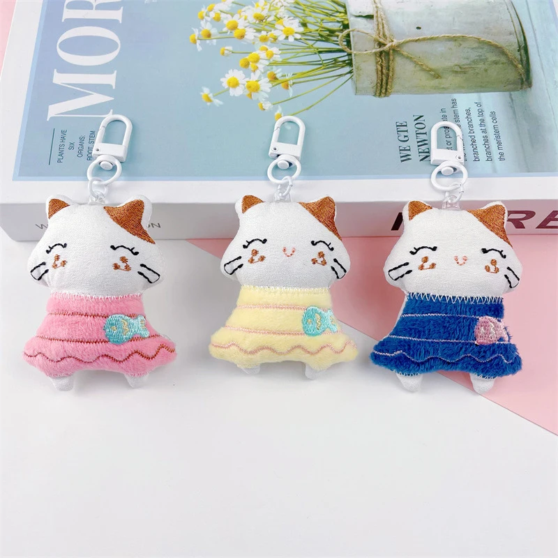 Creative Plush Cat พวงกุญแจเข็มกลัดสําหรับหญิงสาวแฟชั่นการ์ตูนน่ารักพวงกุญแจจี้กระเป๋าเป้สะพายหลังอุปกรณ์ตกแต่งของขวัญ