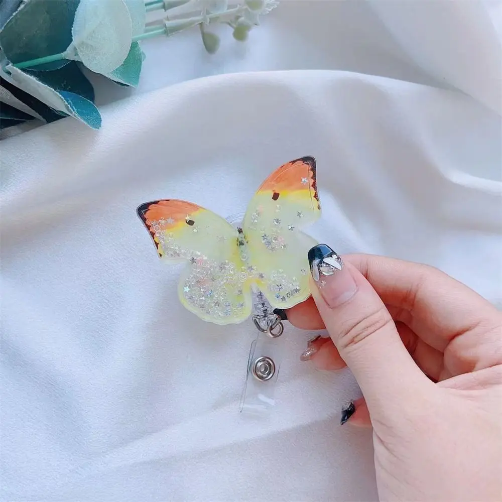 Soporte de insignia de mariposa con cuentas de arena movediza, Clip de tarjeta de identificación giratorio 360, carrete de insignia retráctil, etiqueta de nombre, tarjeta de pecho, suministros escolares de oficina