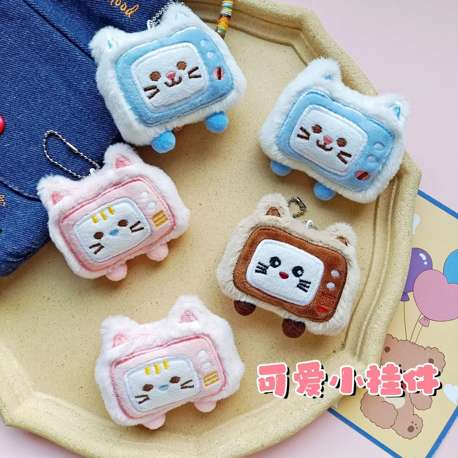 

2025 New Creative Cute Cat Expressions TV Doll Pendant Student Bag Plush Doll Pendant Birthday Gift