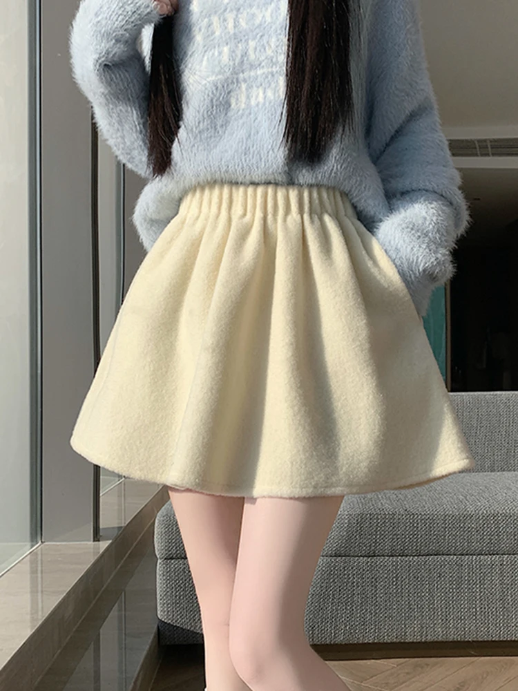 

Модная юбка А-силуэта с высокой талией, женская, зимняя, новинка 2026 года, шерстяная, плиссированная, с эластичным поясом, универсальная, с цветочным узором...