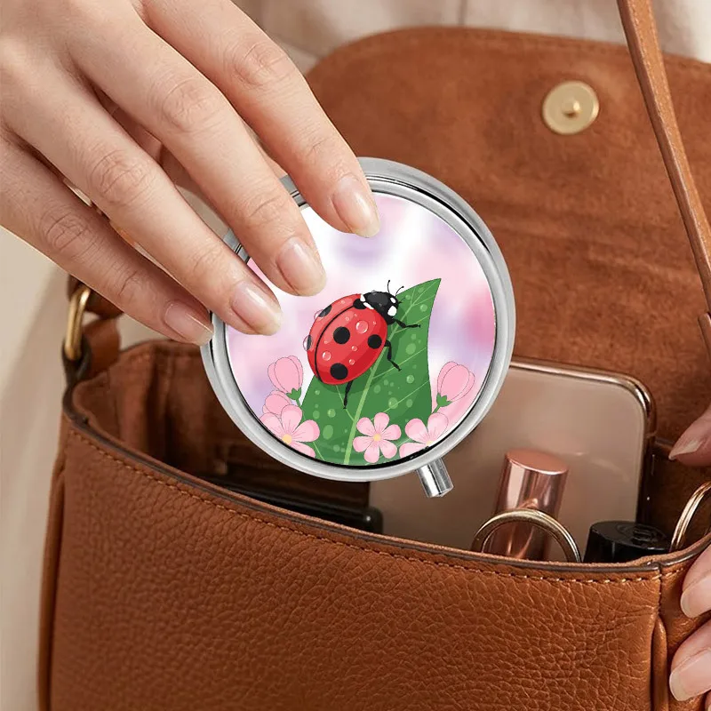 Portable Metal Pill Box, Three-Compartment Design, Travel Pill Box, Medicine Storage Box, Mini Vitamin Box, Ladybug and Flower Pattern, Compact and Portable, Can Be Used as a Pocket-Sized Pill Box, Decorative Jewelry Box, Creative Travel Gift, Durable and Suitable for Women.