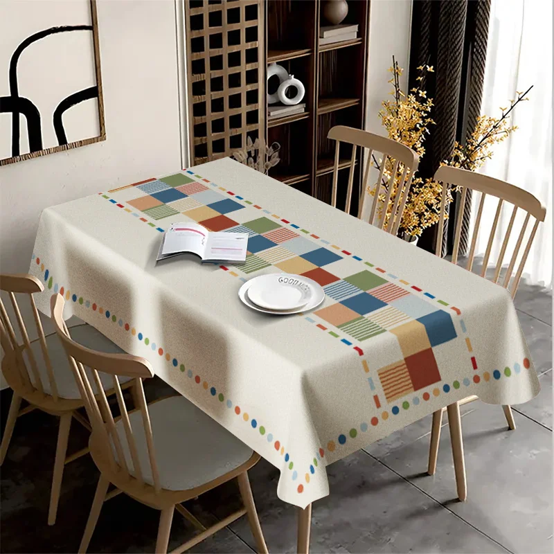 One interesting geometric color-block rectangular tablecloth, featuring contrasting patterns and multi-color patchwork designs.