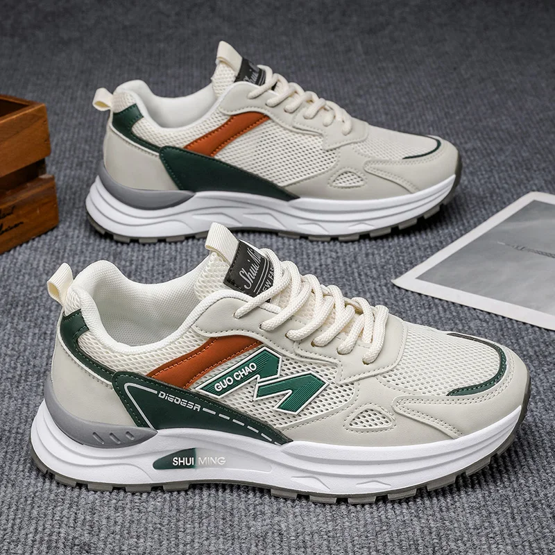 أحذية تنس رجالية في الهواء الطلق مريحة للتنفس ومقاومة للاهتراء أحذية رياضية موضة الرجال شبكة جوفاء حذاء كاجوال Zapatillas Hombre