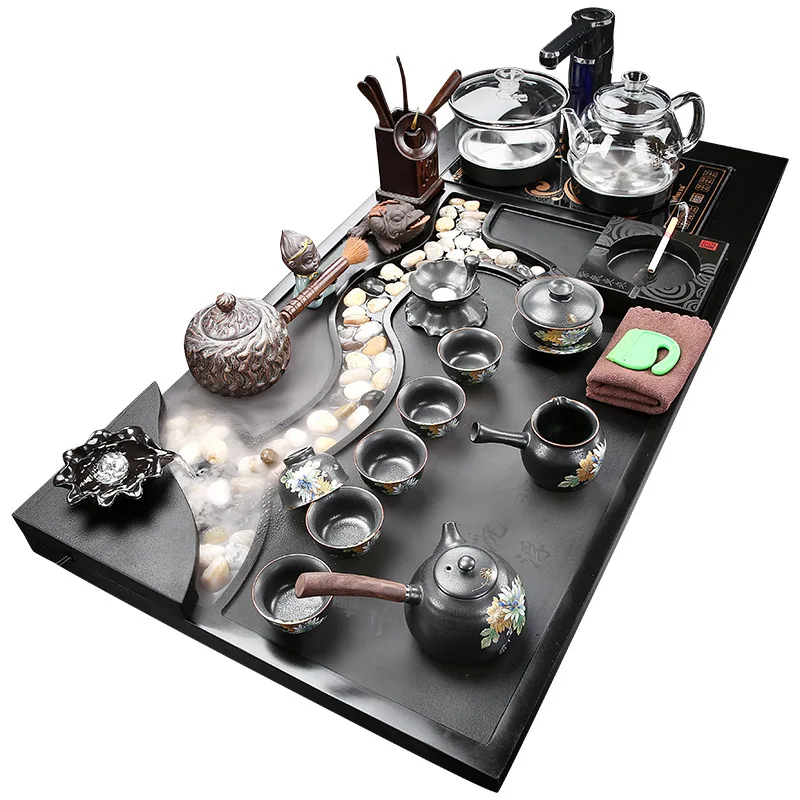 

water atomized black stone tea tray integrated household tea drinking Kung Fu tea set ceramic purple sand automatic