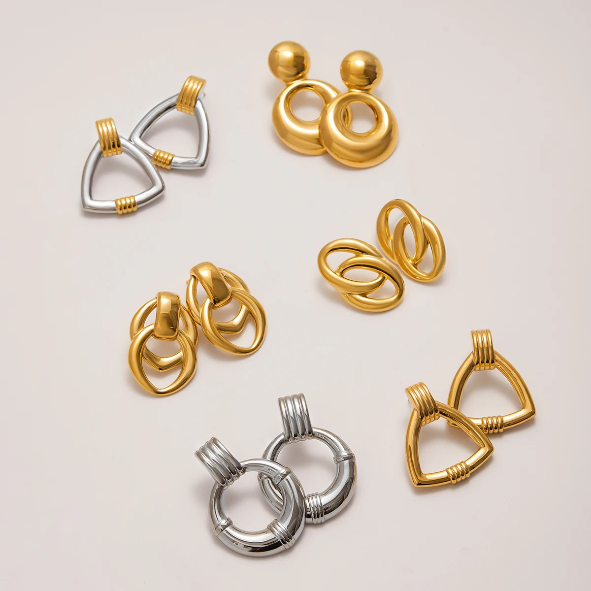 

AIKOER Minimalist 18K Gold Color Plated Stainless Steel Two tone Geometric Ears Studs Oval Wrapped Earrings Women's Accessories