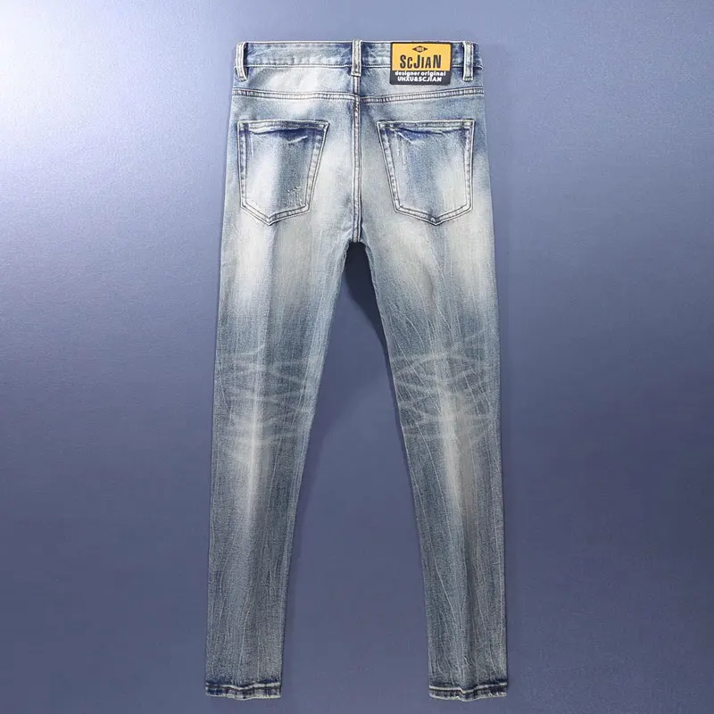 Jeans da uomo alla moda in stile italiano Jeans strappati slim fit elasticizzati retrò azzurri di alta qualità Pantaloni in denim di design vintage da uomo