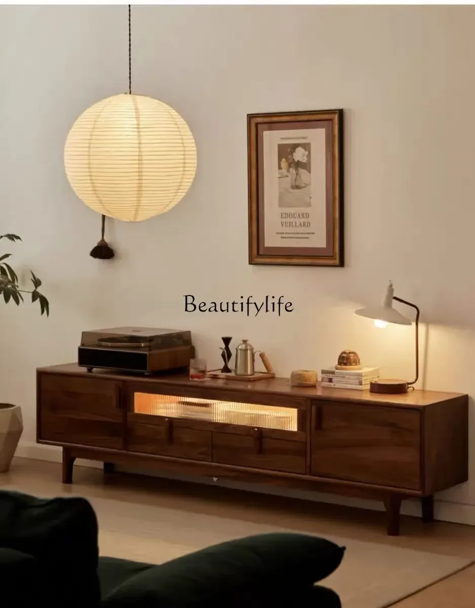 

Nordic black walnut solid wood TV cabinet modern simple small apartment storage locker